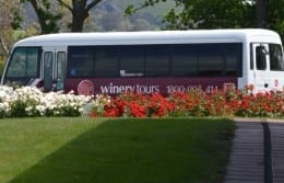 Side view of winery day tour bus